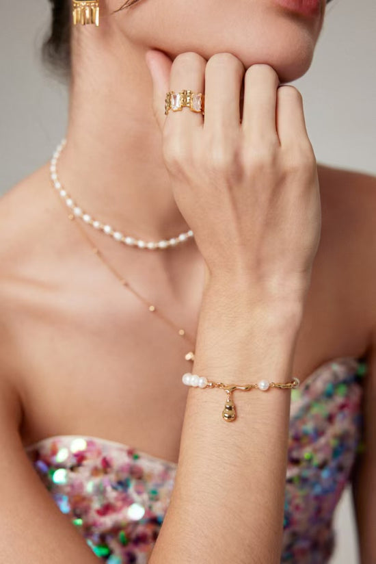 Sterling silver pearl bracelet with natural baroque pearls and silver pendant designed with natural elements